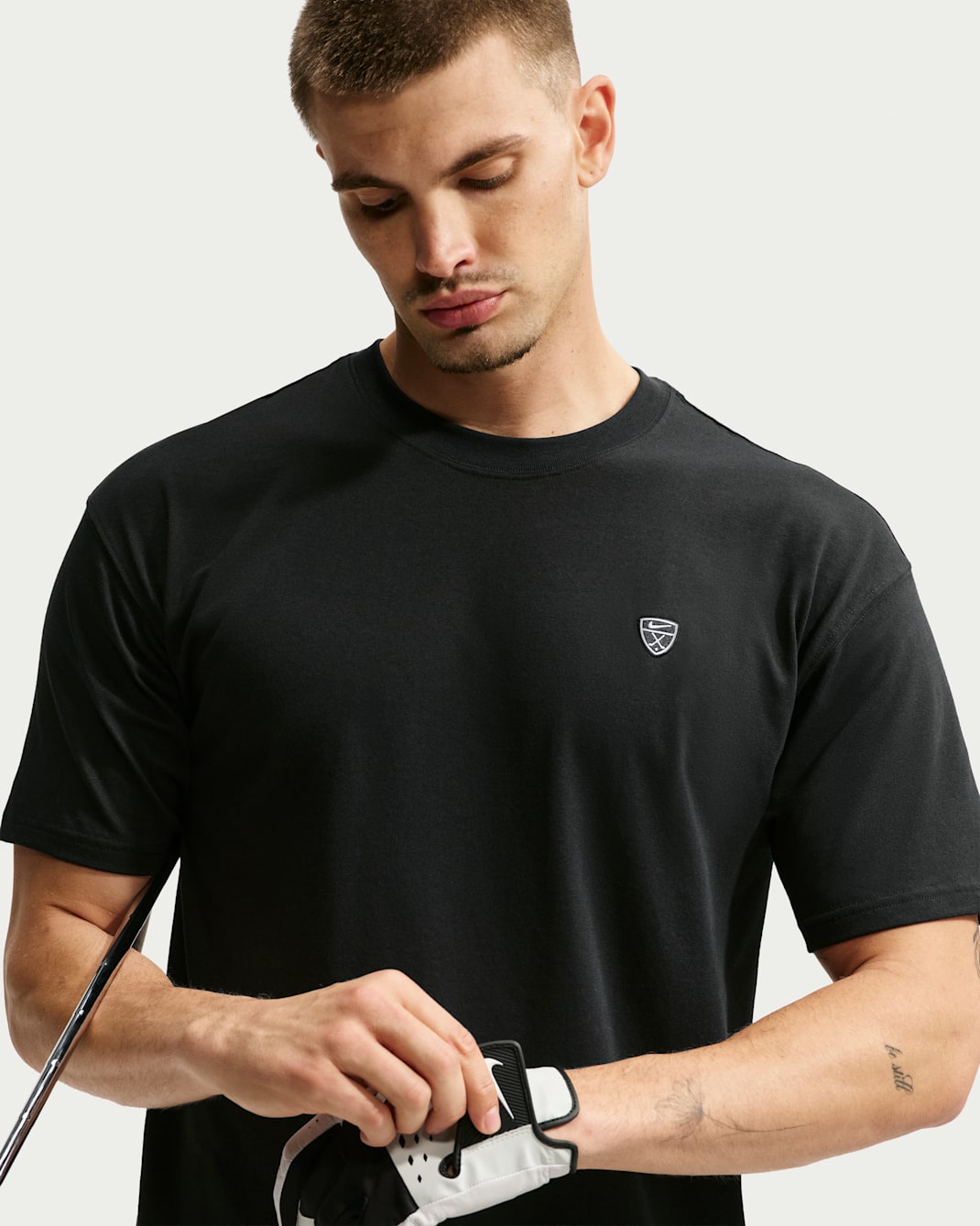 Golf-t-shirt Nike Dri-FIT lös passform för män - Svart