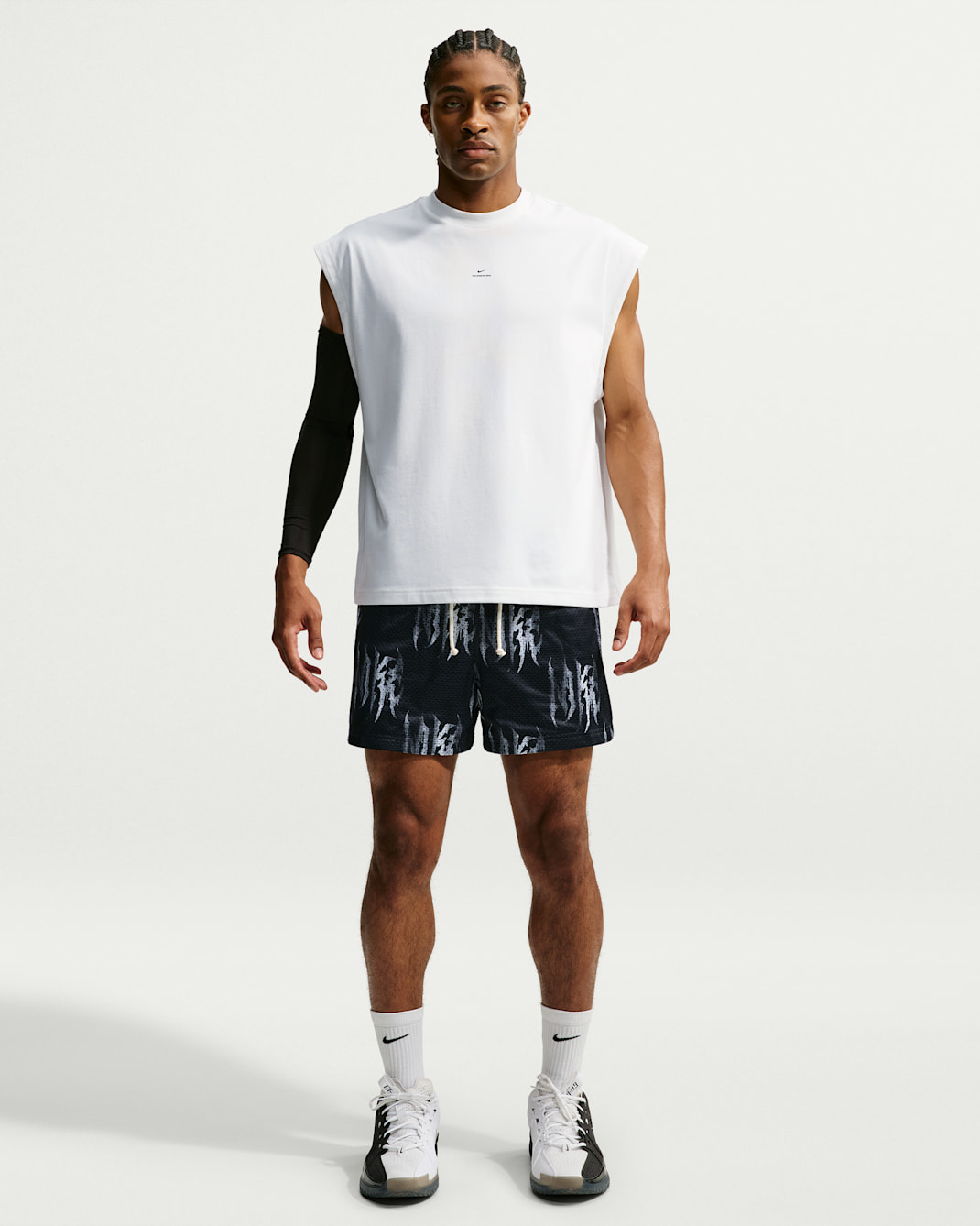 Short d'entraînement de basket en mesh Nike Standard Issue 13 cm pour homme - Noir/Pale Ivory