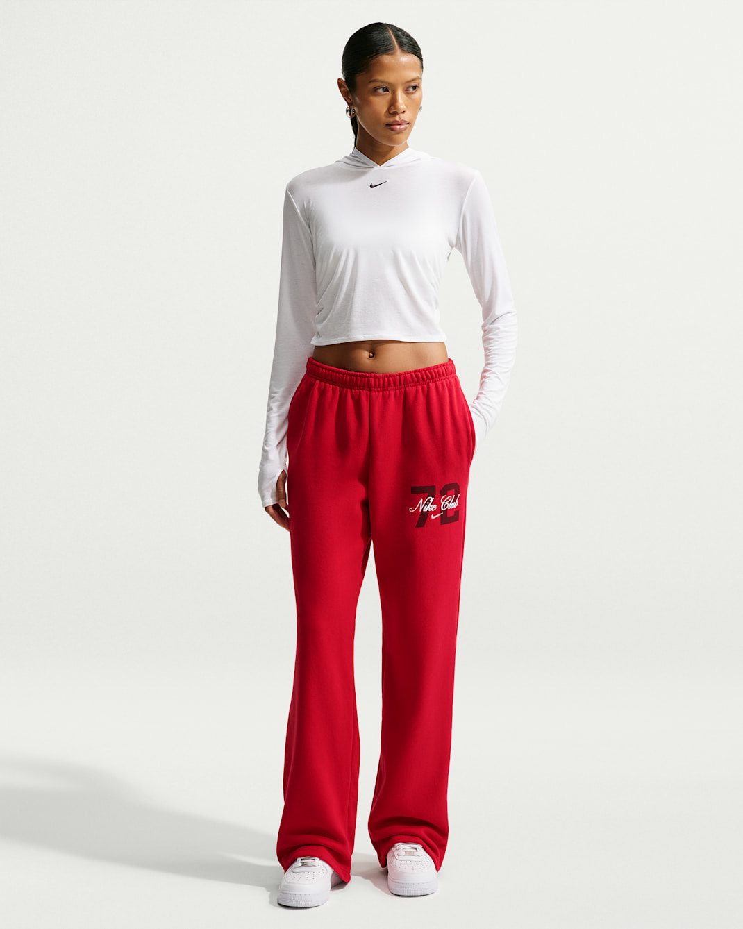 Pantalon taille mi-haute à ourlet ouvert Nike Studio Fleece Medium Weight pour femme - Gym Red