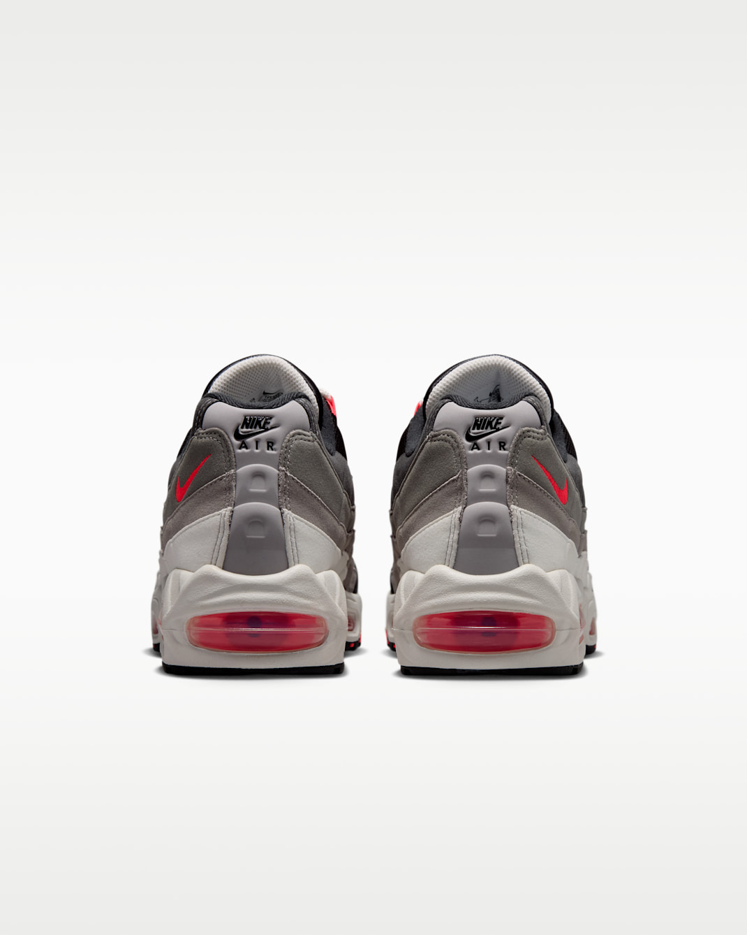 Nike Air Max 95 Reverse Solar Red heel detail showing Nike Air branding on lighter panel and Solar Red Air unit