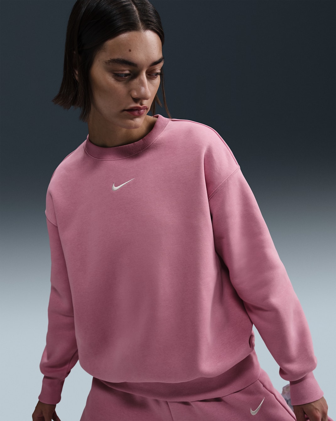 Sudadera oversized de cuello redondo de tejido Fleece para mujer Nike Sportswear Phoenix - Rosa elemental/Vela