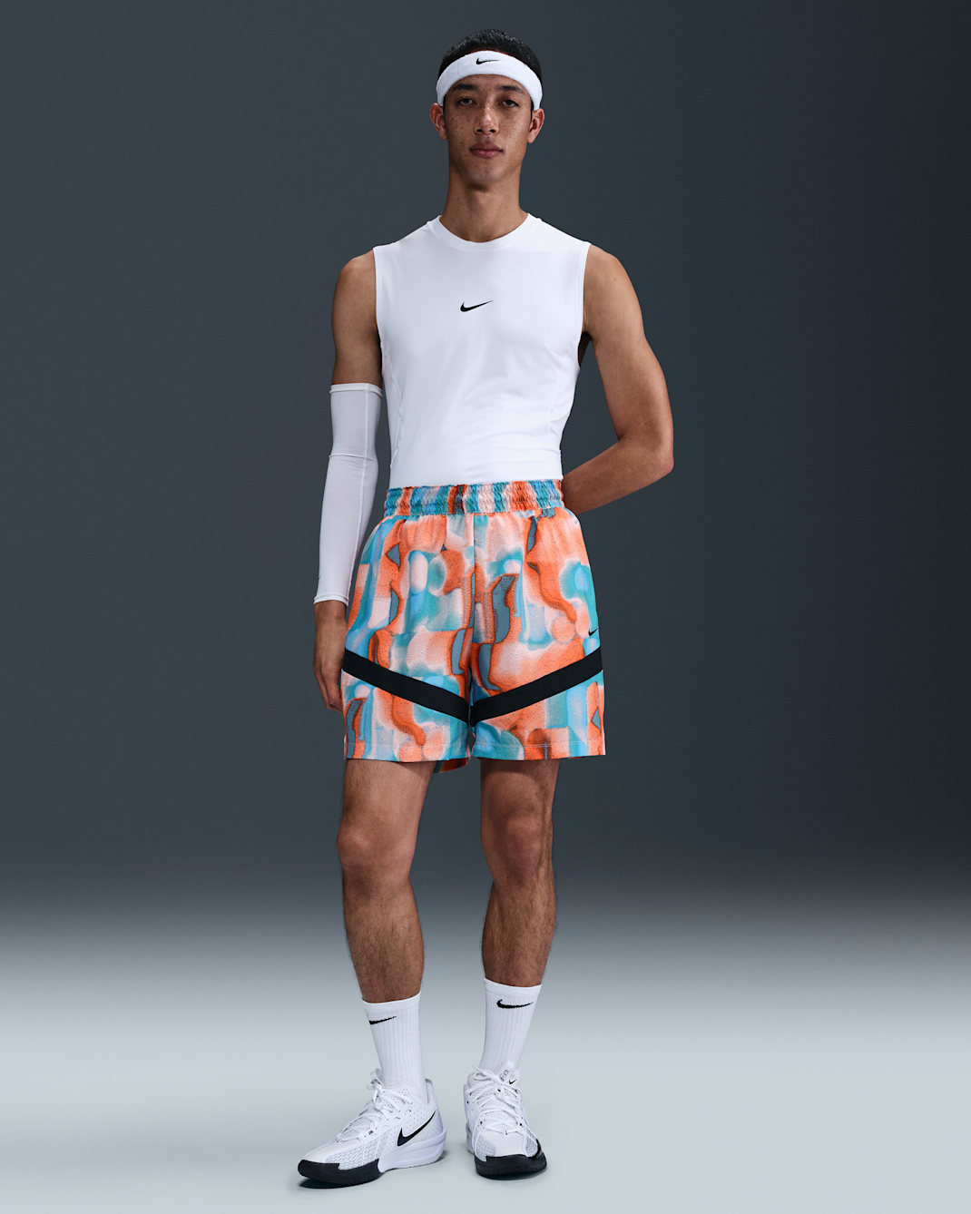 Shorts de básquetbol Dri-FIT de 15 cm para hombre Nike Icon - Coral lavado/Azul universitario/Negro/Negro