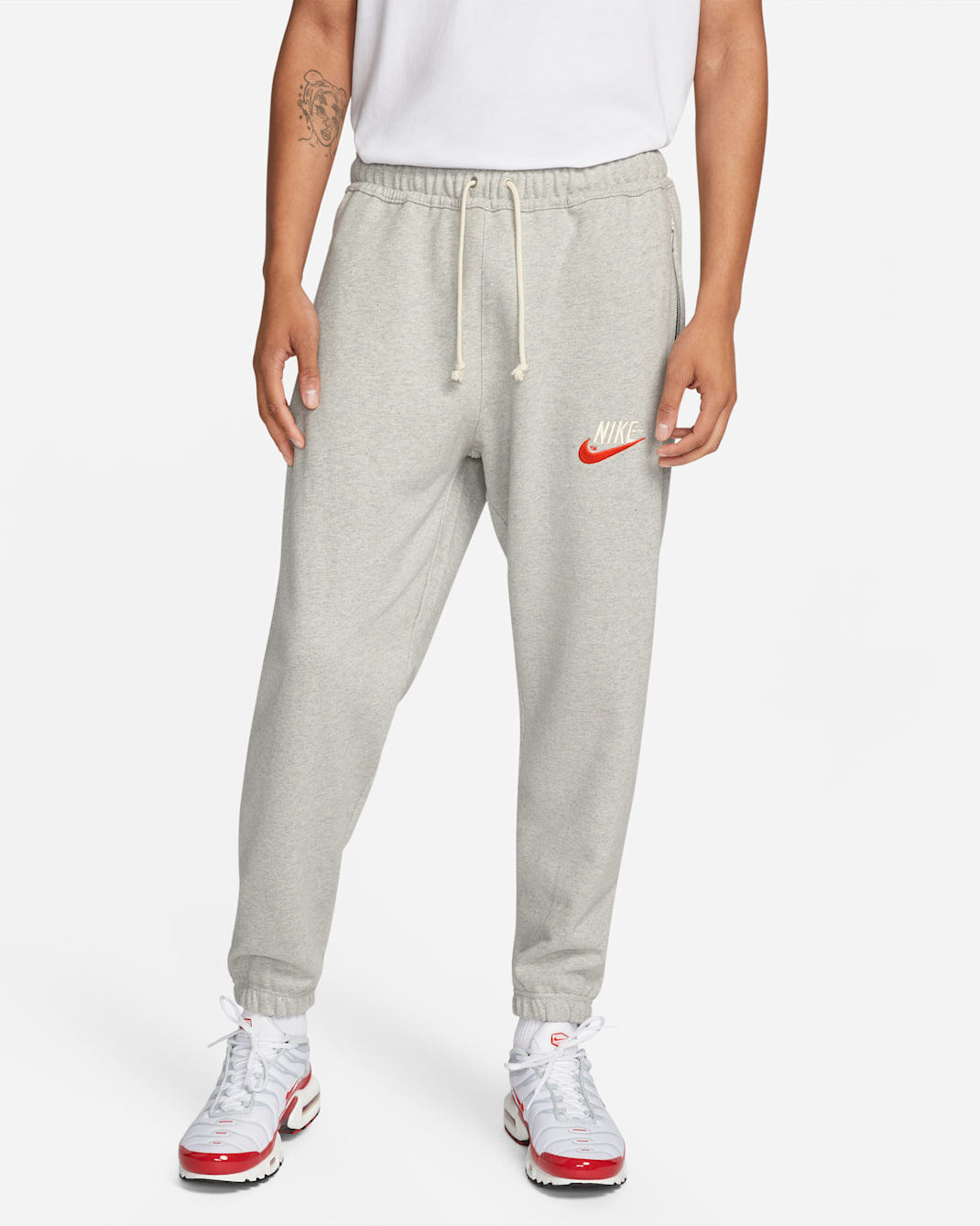 Pantalones sneaker para hombre Nike Sportswear - Gris jaspeado/Sombrío apagado/Vela/Naranja team