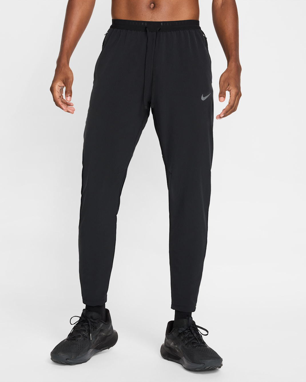 Pantaloni da running in tessuto Dri-FIT Nike Stride – Uomo - Nero