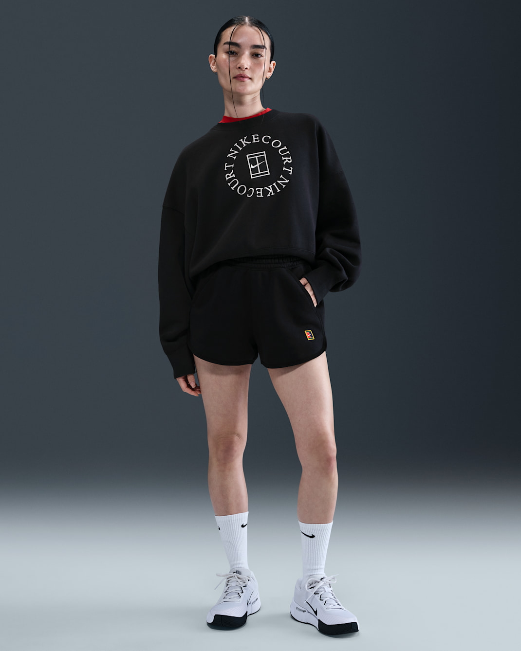 Shorts de tenis de tejido Fleece de tiro medio para mujer NikeCourt Heritage - Negro