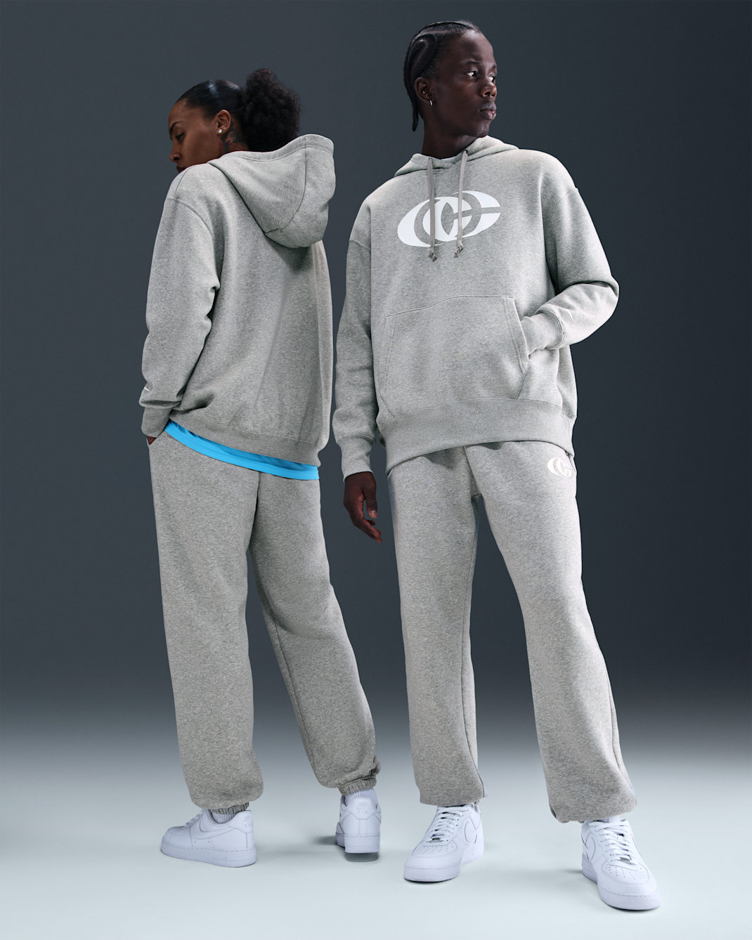 Pants de tejido Phoenix Fleece Nike Básquetbol Caitlin Clark - Gris oscuro jaspeado/Blanco/Blanco