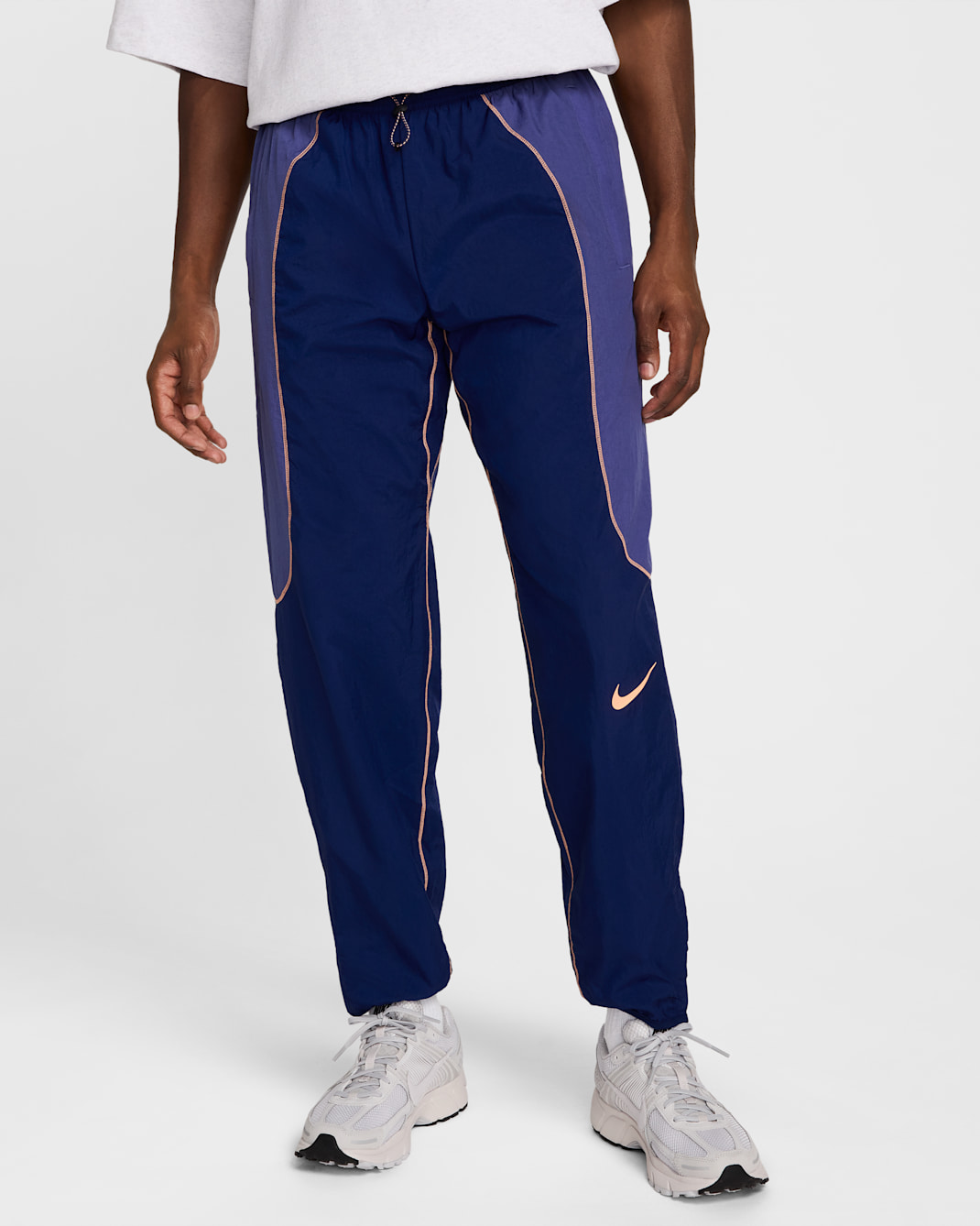 Nike Strike+ Men's Water-Repellent Soccer Pants - Blue Void/Dark Purple Dust/Orange Pulse/Orange Pulse