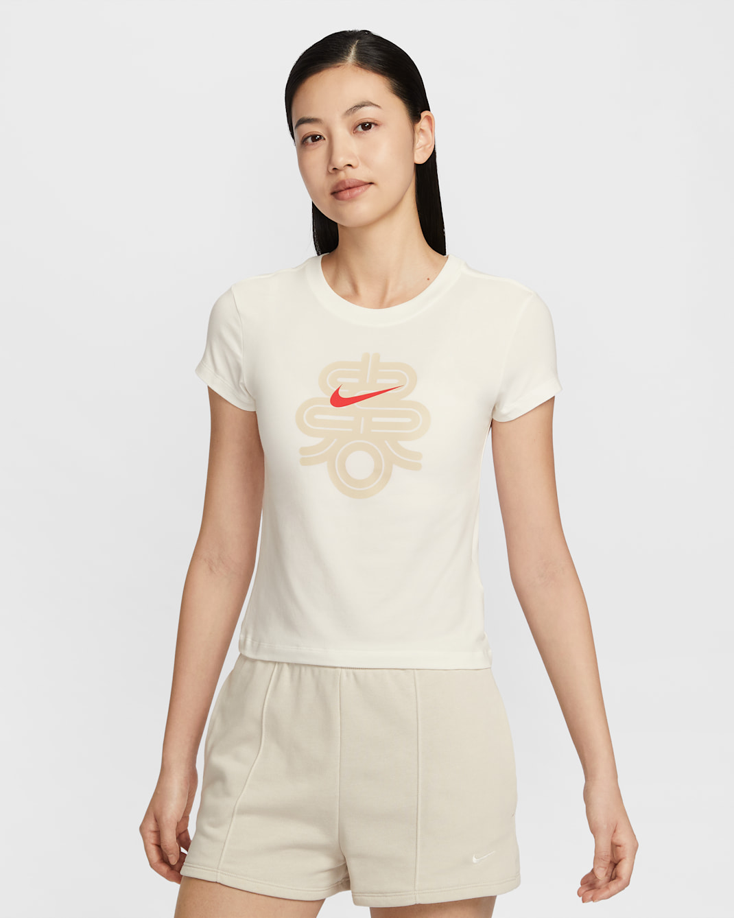 เสื้อยืดเอวลอยผู้หญิง Nike Sportswear Chill Knit - Sail