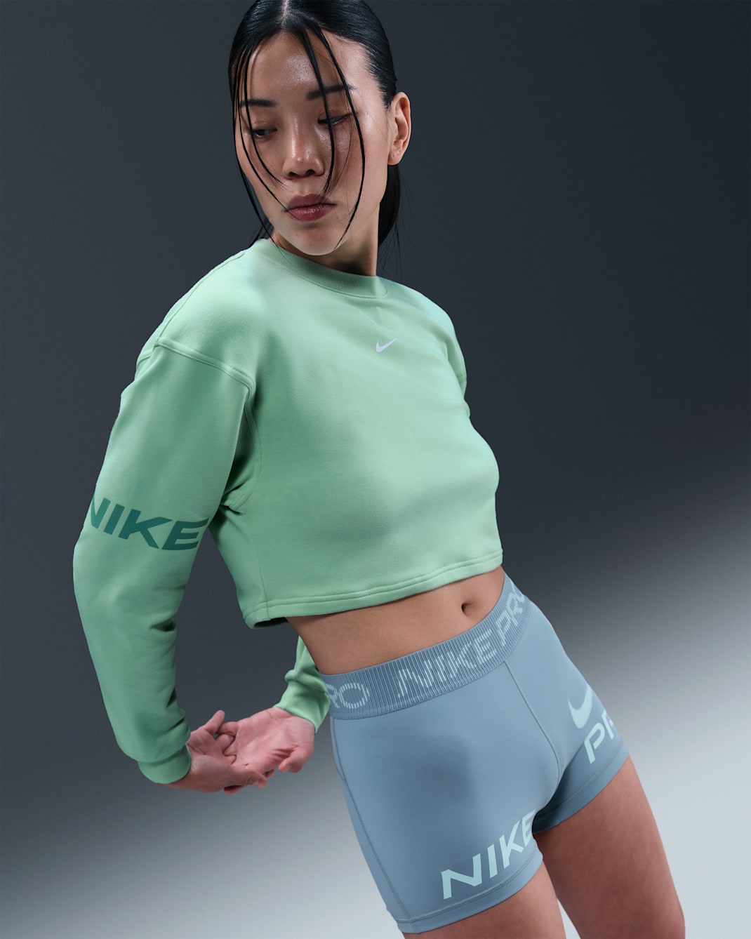 Nike Pro Women's Dri-FIT Loose Crew-Neck French Terry Sweatshirt - Mint Foam/Cannon/White