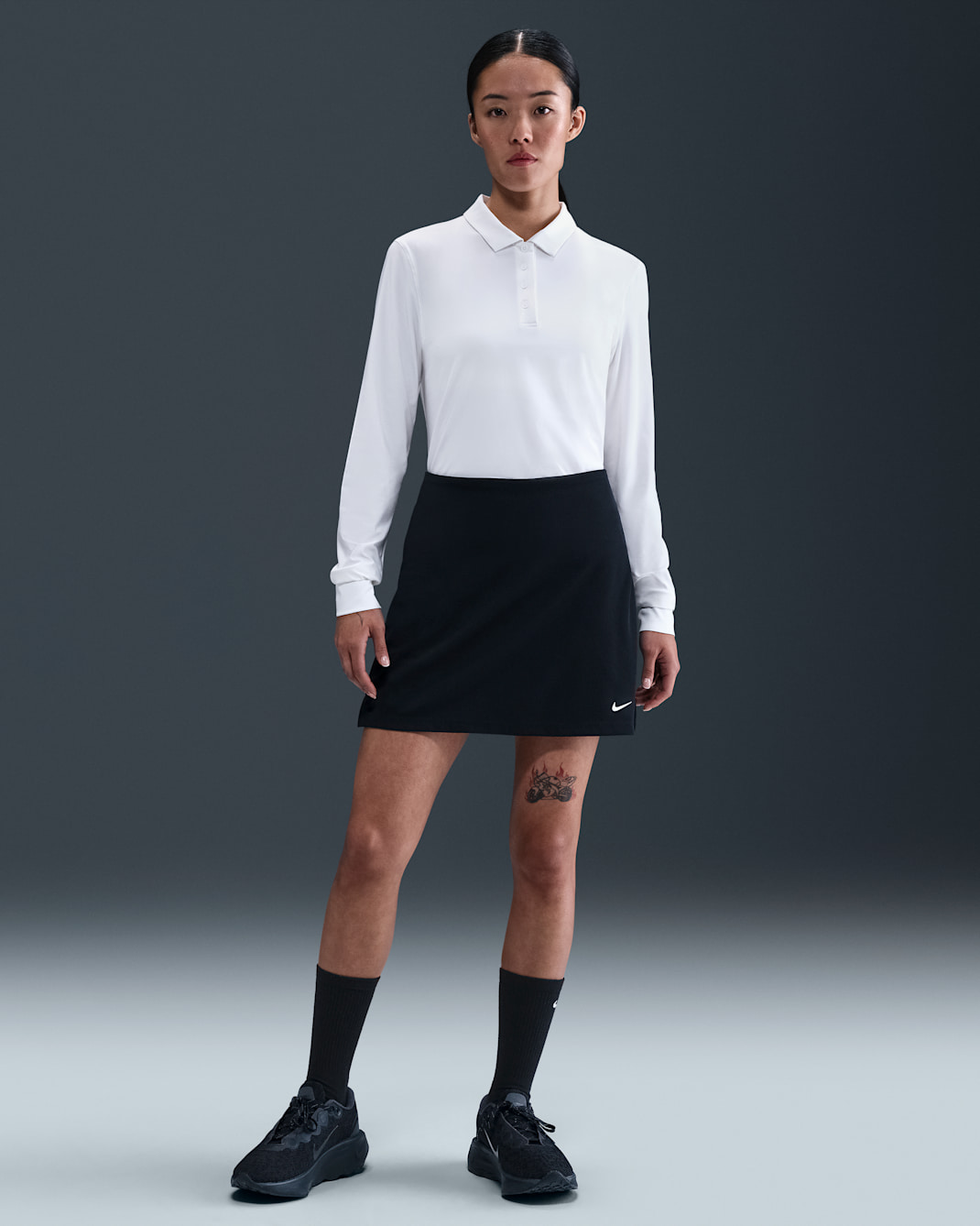 กระโปรงกอล์ฟผู้หญิง Dri-FIT ADV Nike Tour - ดำ/ขาว