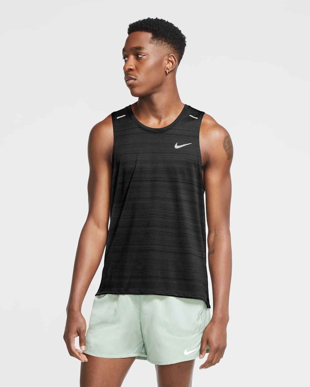 เสื้อกล้ามวิ่งผู้ชาย Nike Dri-FIT Miler - ดำ