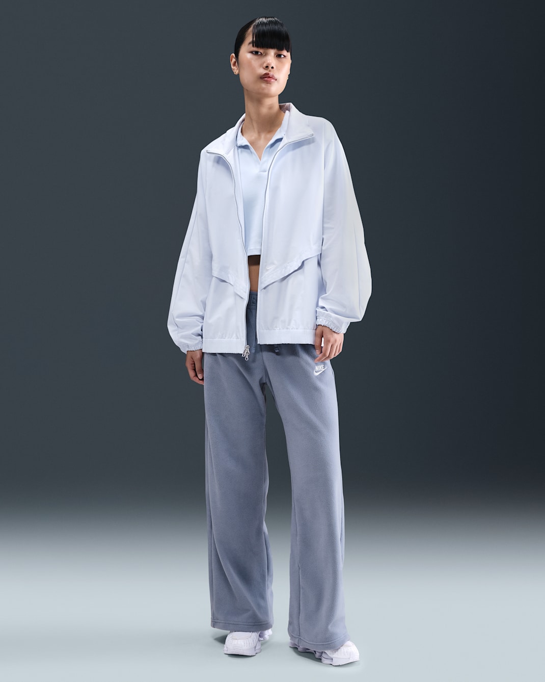 Pants de tiro medio y pierna amplia cómodos para mujer Nike Sportswear Club Fleece - Índigo mundial/Azul celestino