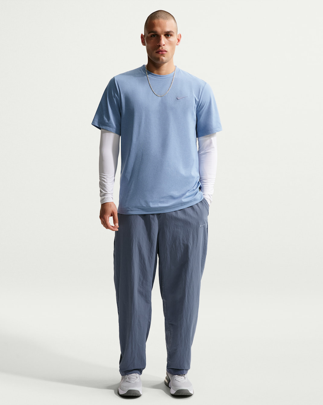 Pánské tkané tréninkové kalhoty Nike NAC Dri-FIT - Diffused Blue/Pale Ivory/Diffused Blue