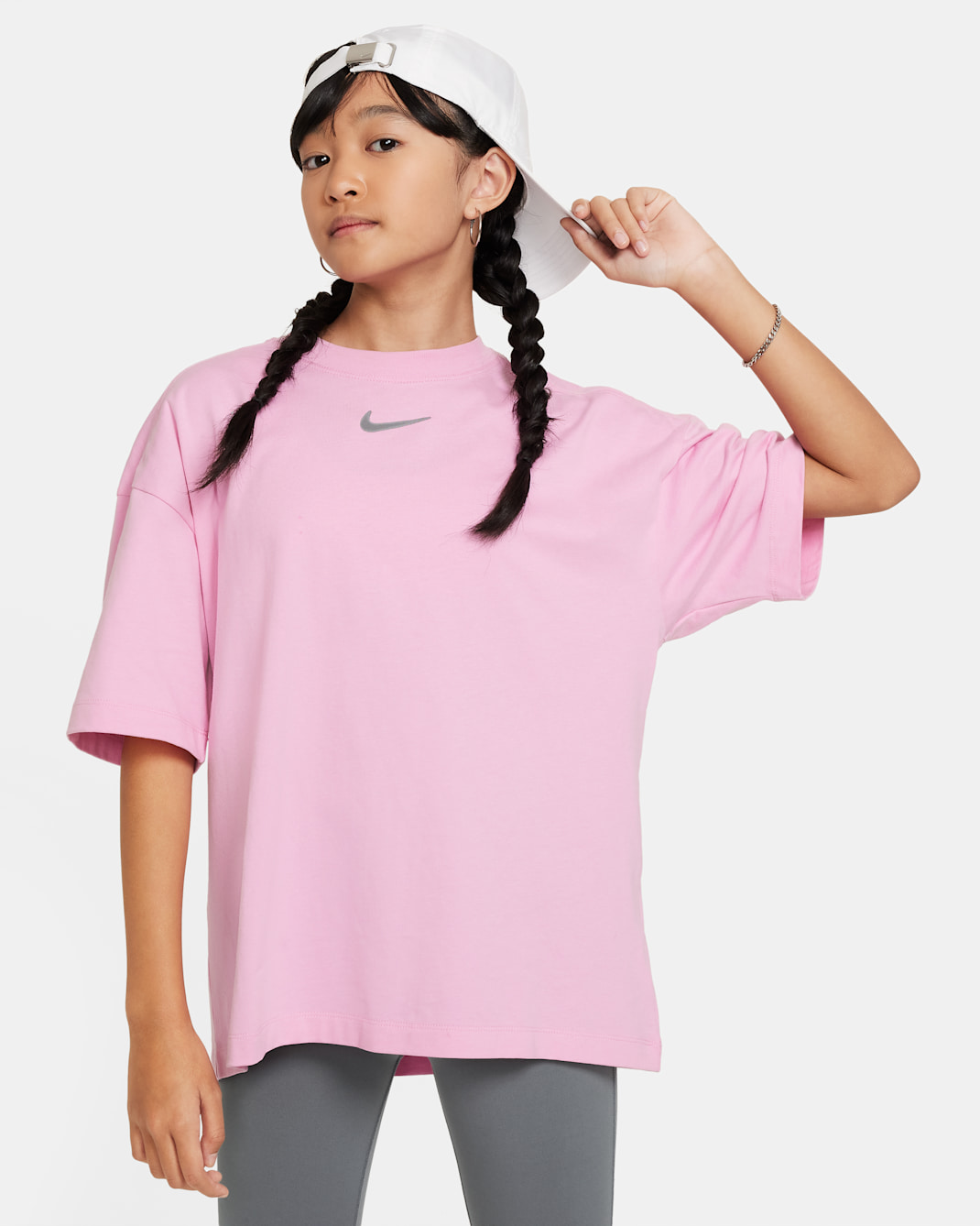 เสื้อยืดขนาดโอเวอร์ไซส์เด็กโต Nike Sportswear (หญิง) - Pink Rise