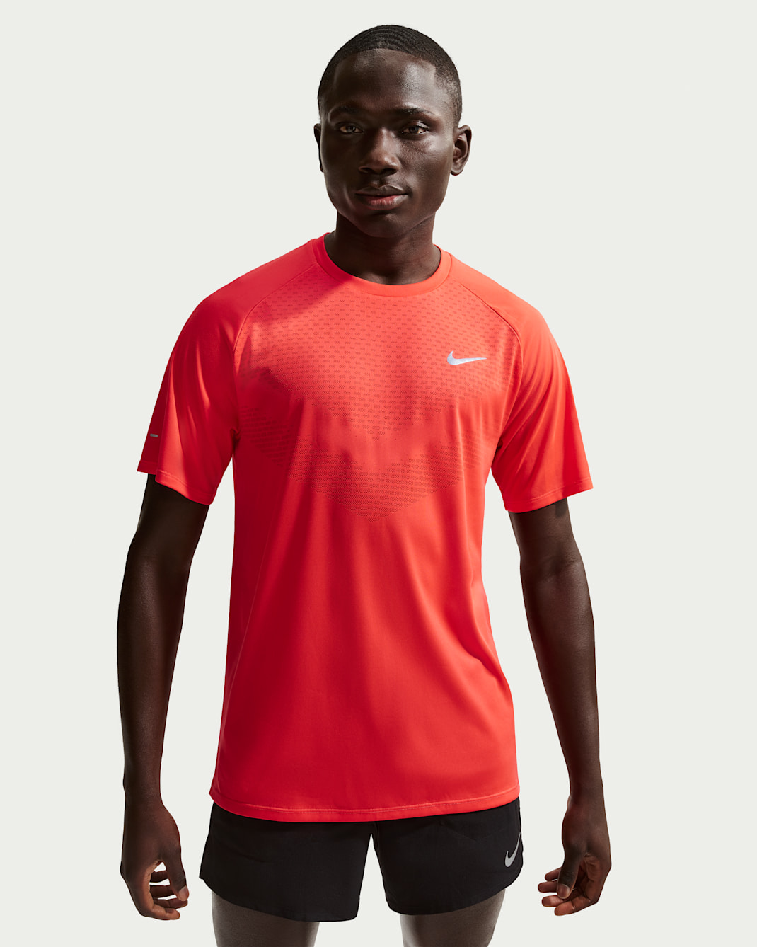 Kortärmad löpartröja Nike Stride Dri-FIT ADV för män - Light Crimson