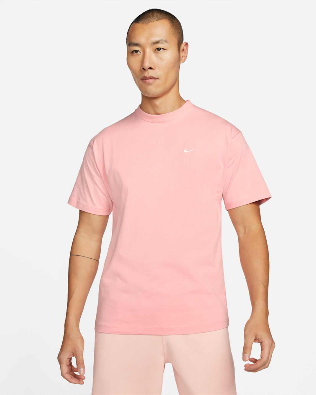 Nike Solo Swoosh Men's T-Shirt - Bleached Coral/White
