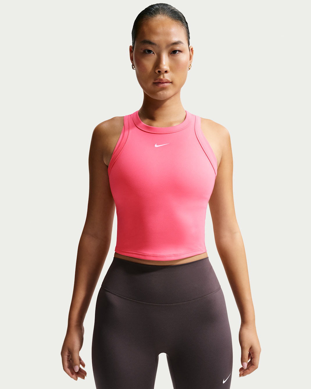 Camiseta de tirantes Dri-FIT cropped para mujer Nike One Fitted - Coral marino/Blanco