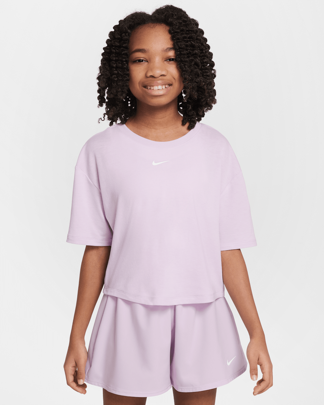 Nike One Relaxed Older Kids' (Girls') Dri-FIT Short-Sleeve Top - Doll/White