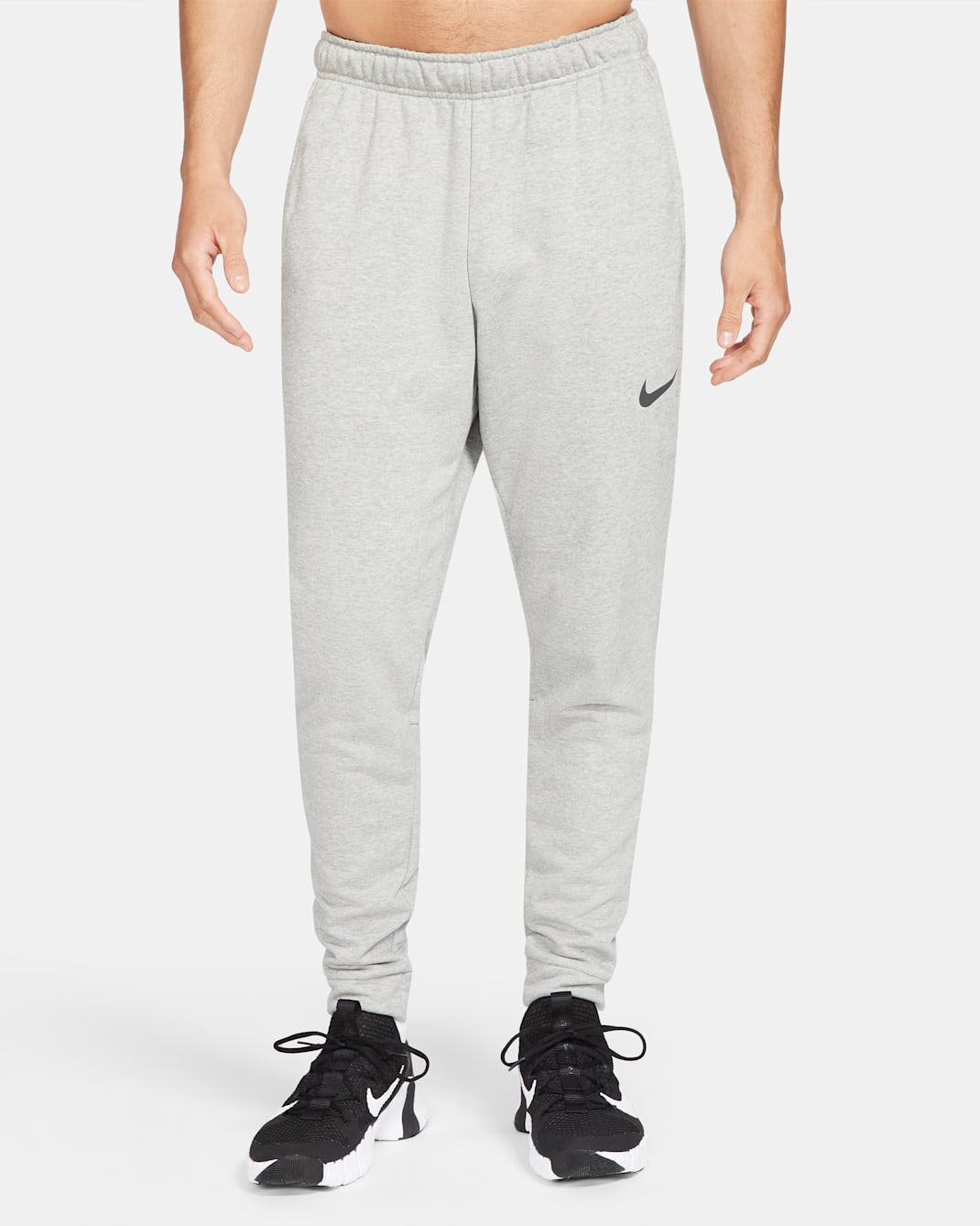 Nike Dry avsmalnet fleecetreningsbukse med Dri-FIT til herre - Dark Grey Heather/Svart