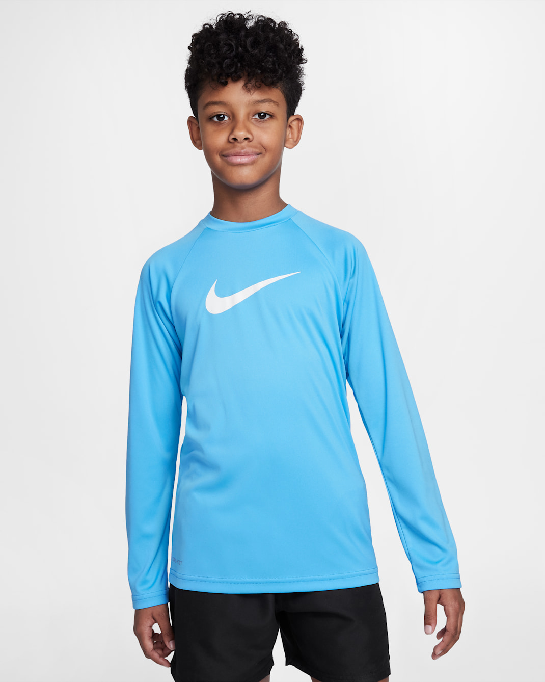 Playera de manga larga Hydroguard para niño talla grande Nike Swim Solid - Azul universitario/Blanco