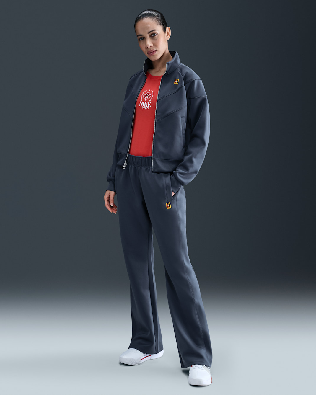Pantalon de tennis taille mi-haute NikeCourt Heritage Windrunner pour femme - Diffused Blue