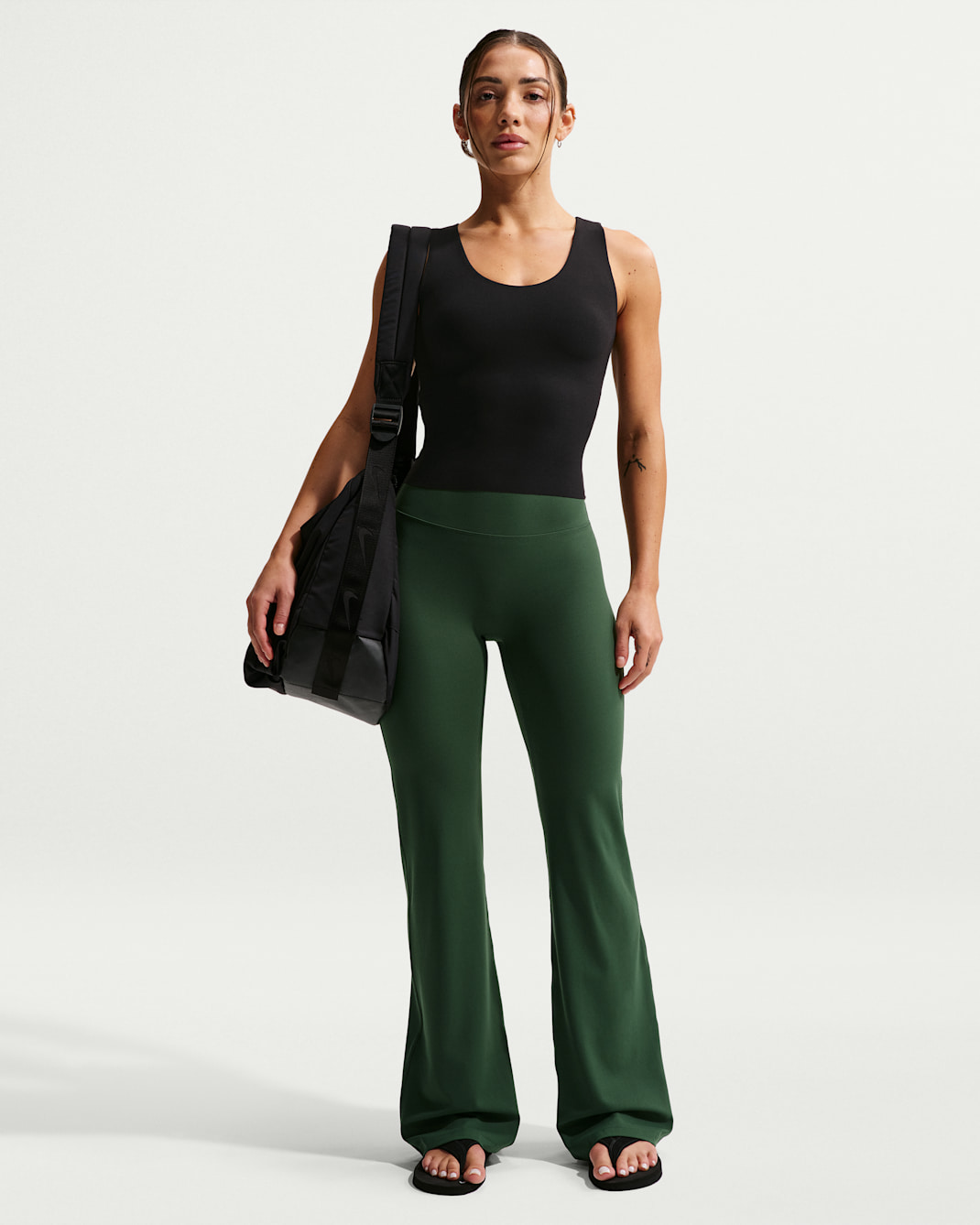 Nike Zenvy Women's High-Waisted Flared Leggings with No Front Seam - Fir/White