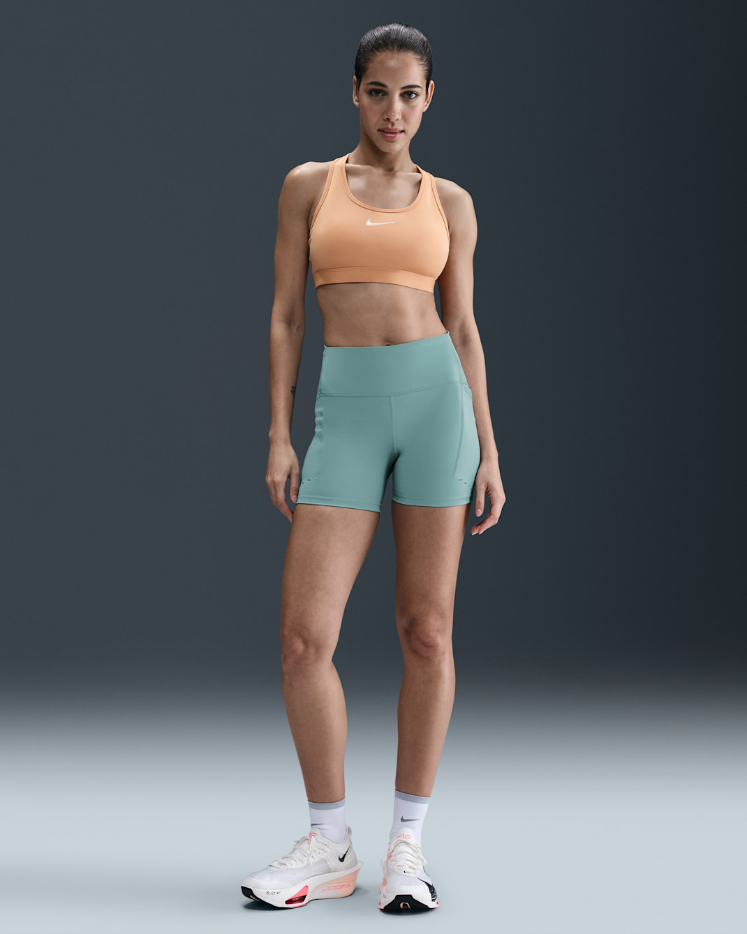 Nike Swift Women's High-Waisted 4" Tight Running Shorts with Pockets - Cannon
