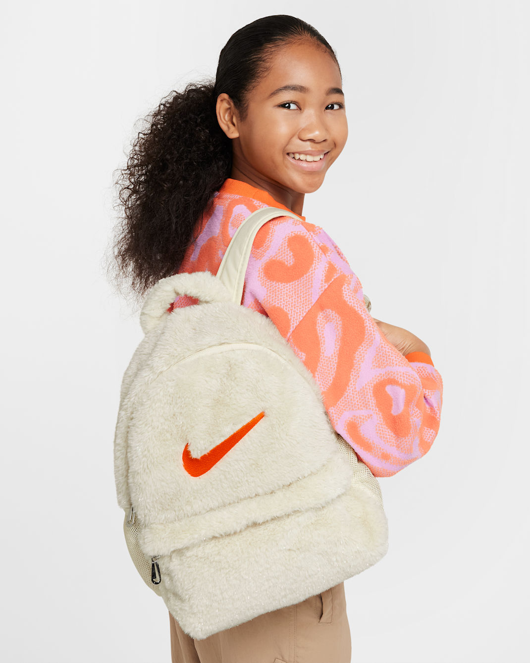 Nike Older Kids' Faux Fur Backpack (11L) - Coconut Milk/Coconut Milk/Safety Orange