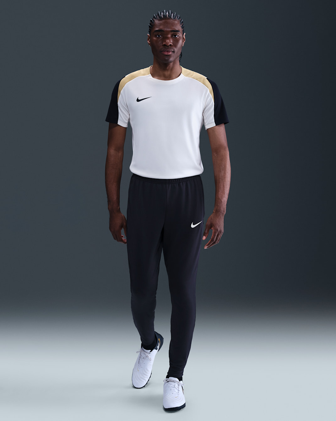 Ανδρικό ποδοσφαιρικό παντελόνι Dri-FIT Nike Strike - Μαύρο/Jersey Gold/Pale Ivory