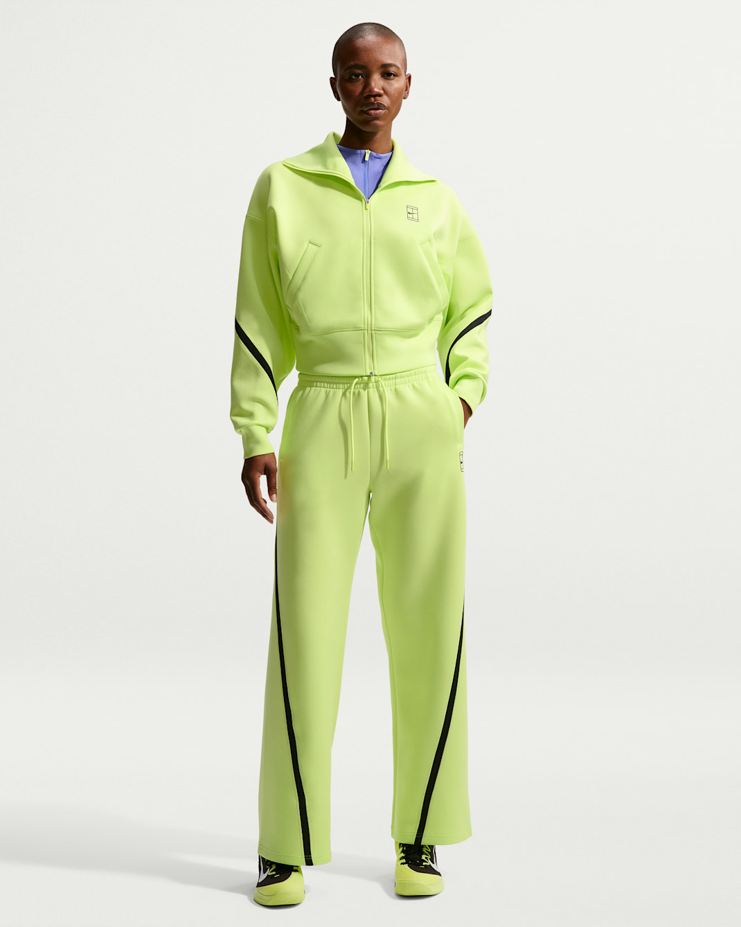 Nike Advantage Dri-FIT tennisbukse med mellomhøyt liv til dame - Light Lemon Twist/Svart