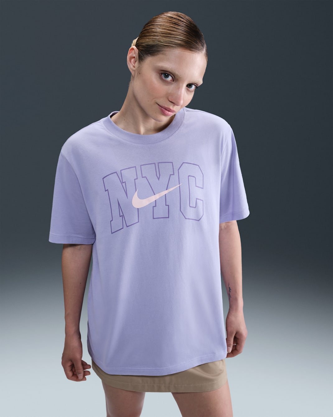 Nike Sportswear Essential Women's Graphic T-Shirt - Lilac Ice/Washed Coral