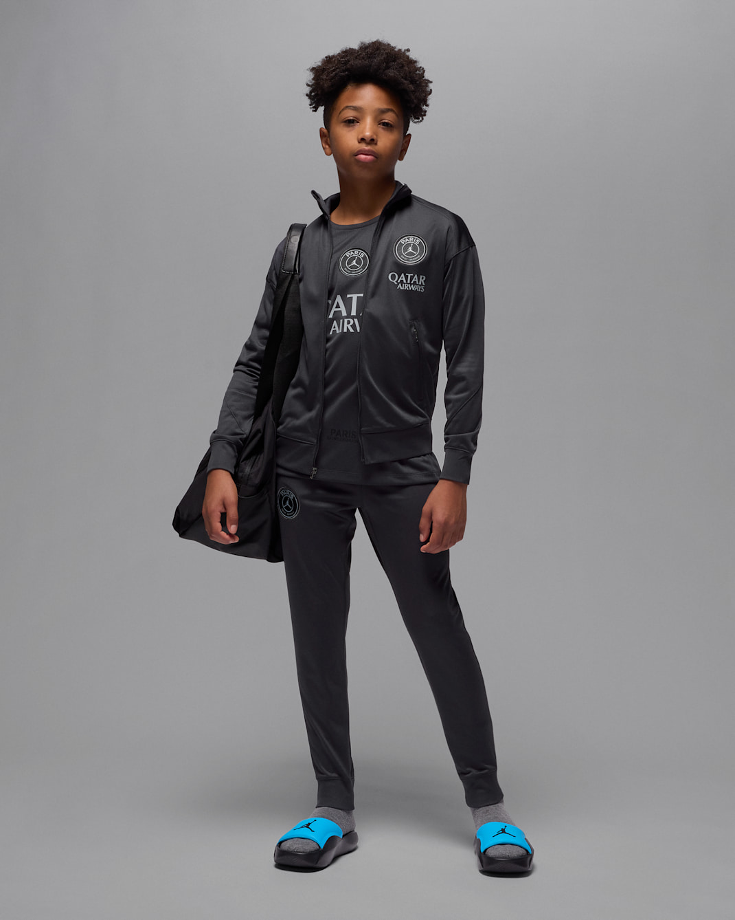 Paris Saint-Germain Strike Fourth Jordan Dri-FIT Fußball-Trainingsanzug für ältere Kinder - Off Noir/Off Noir/Particle Grey