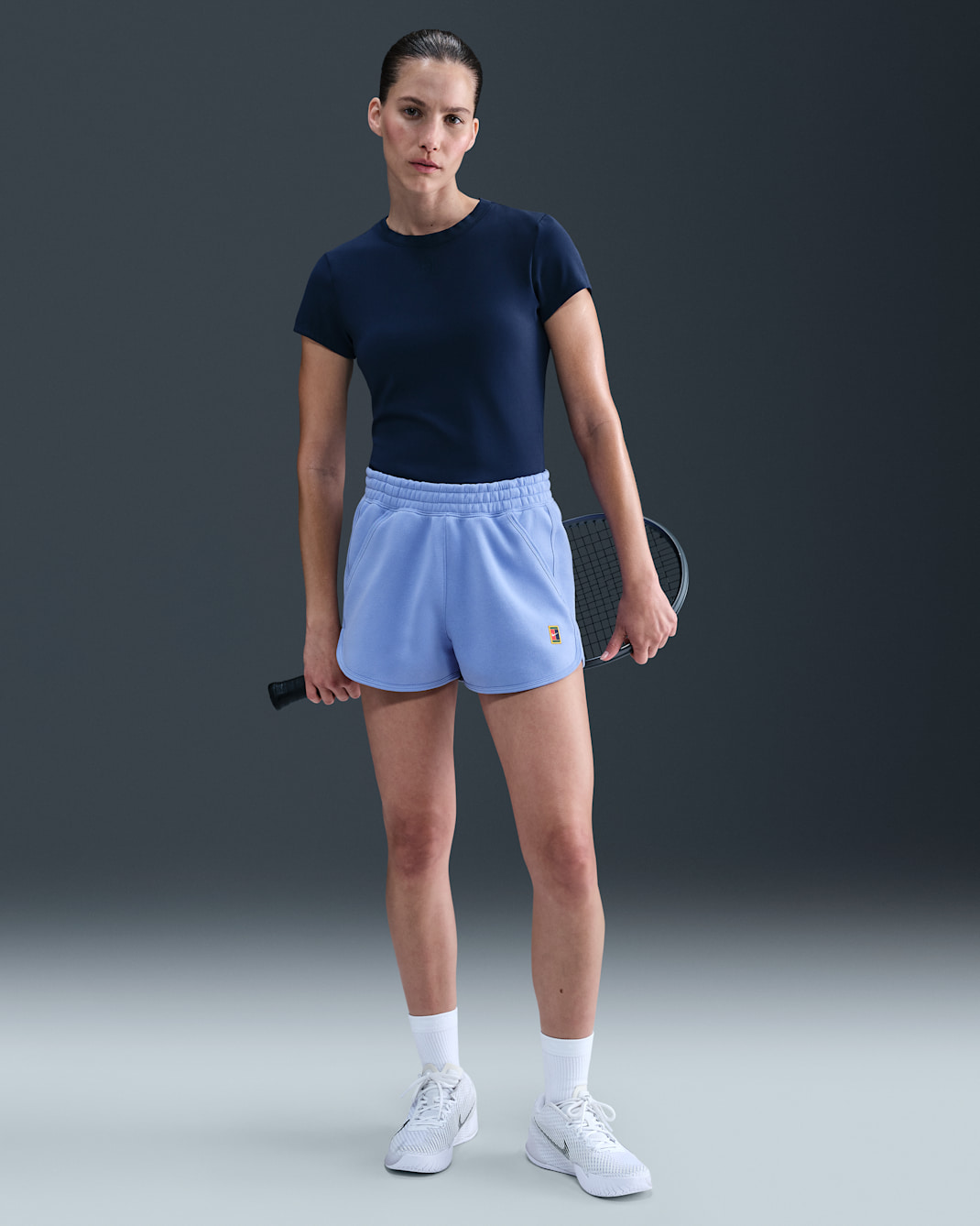 Shorts de tenis de tejido Fleece de tiro medio para mujer NikeCourt Heritage - Royal pulso