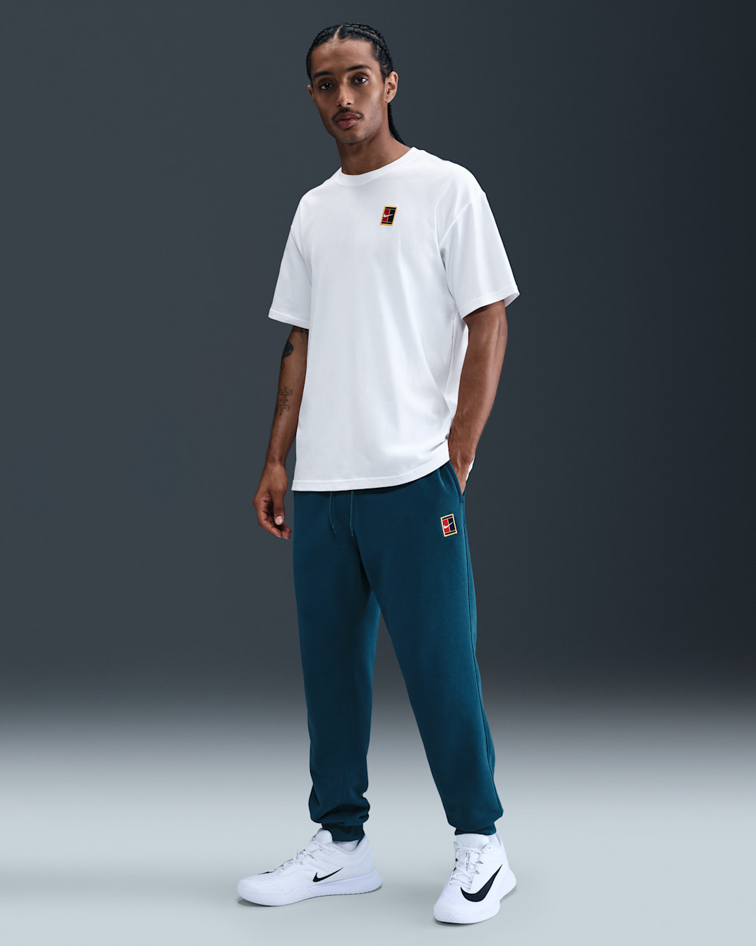 Joggers de tenis de tejido Fleece Dri-FIT para hombre NikeCourt Heritage - Azul fuerza
