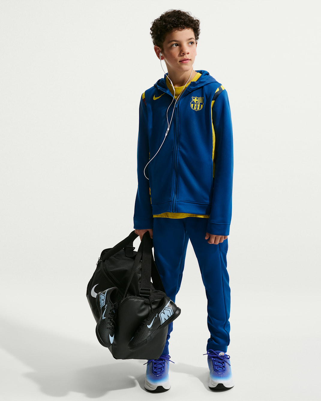 F.C. Barcelona Older Kids' Nike Football Woven Tracksuit - Gym Blue/Opti Yellow