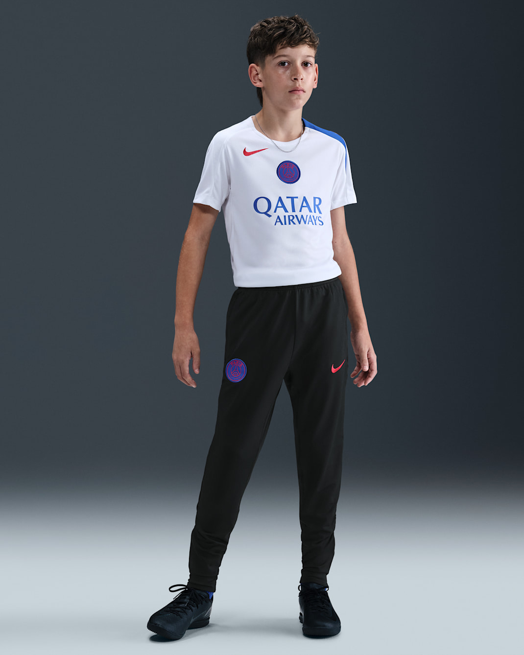 Paris Saint-Germain Strike Third Older Kids' Nike Dri-FIT Total 90 Football Knit Pants - Black/Hyper Royal/Global Red