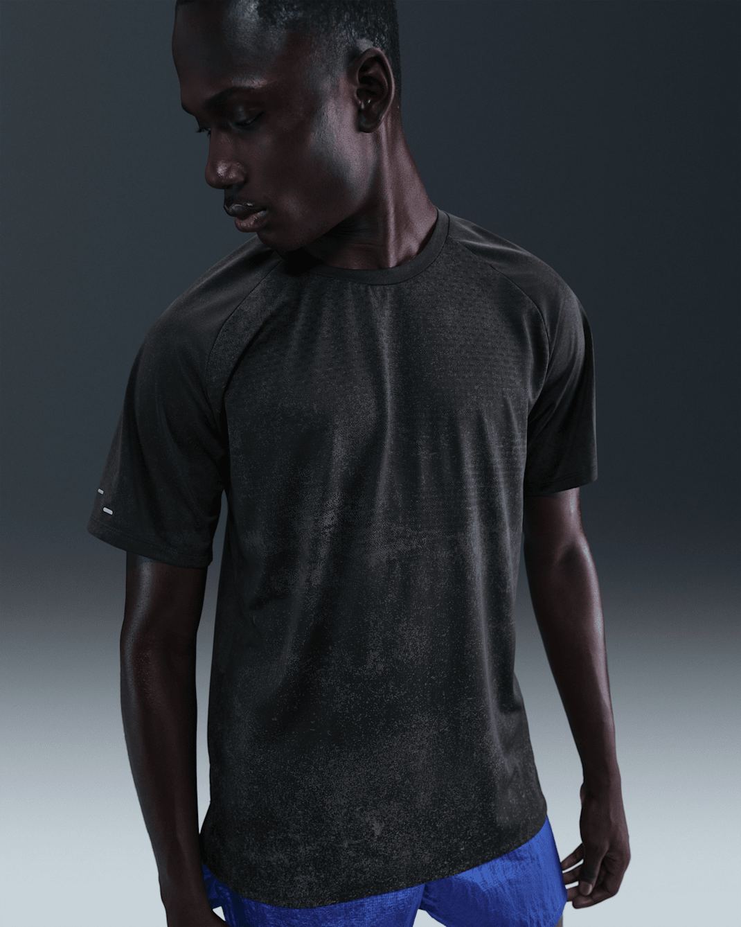 Nike Stride Men's Dri-FIT ADV Short-Sleeve Running Top with Reflective Design Accents - Off-Noir