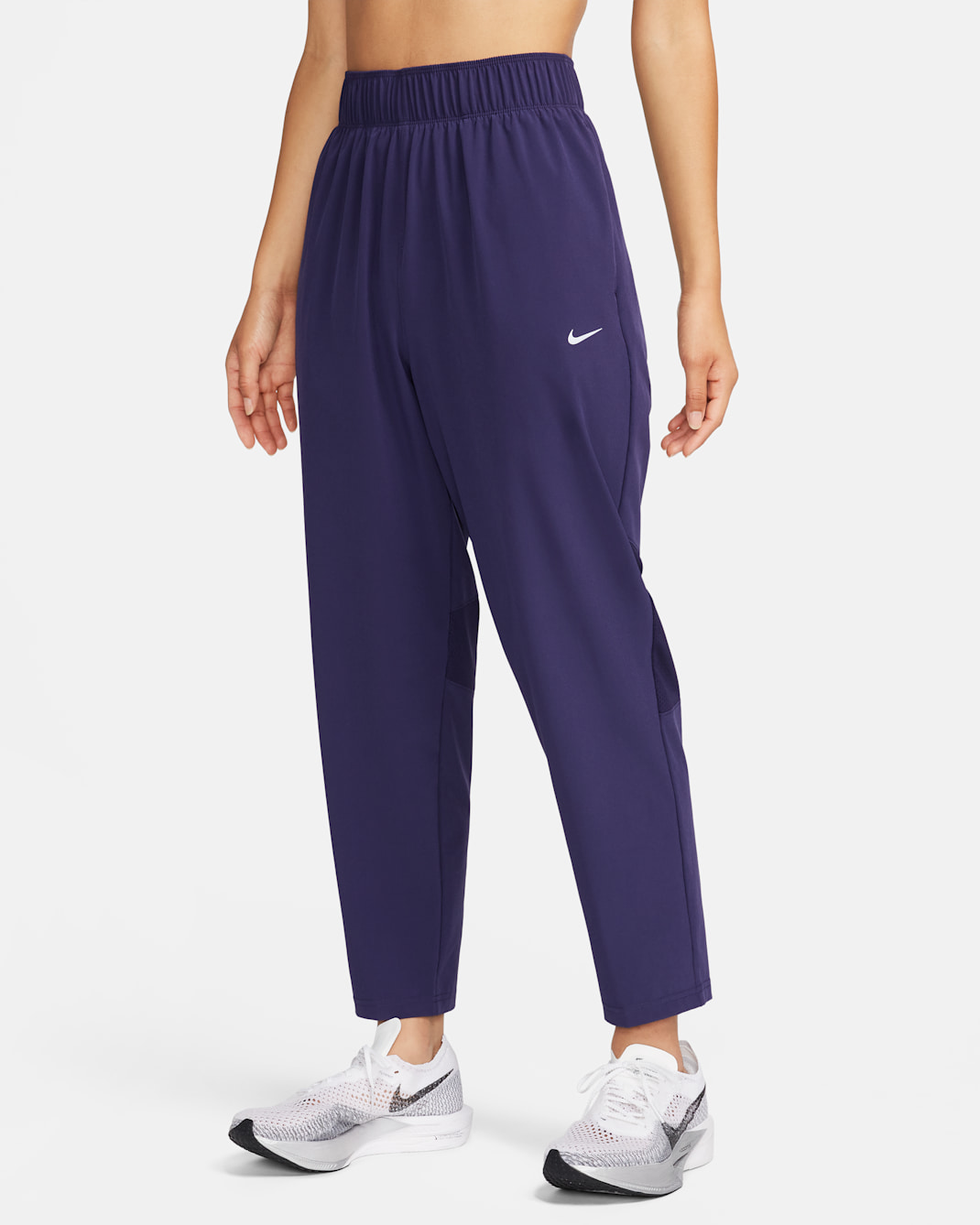 กางเกงวิ่งขายาวเอวปานกลาง 7/8 ส่วนผู้หญิง Nike Dri-FIT Fast - Purple Ink