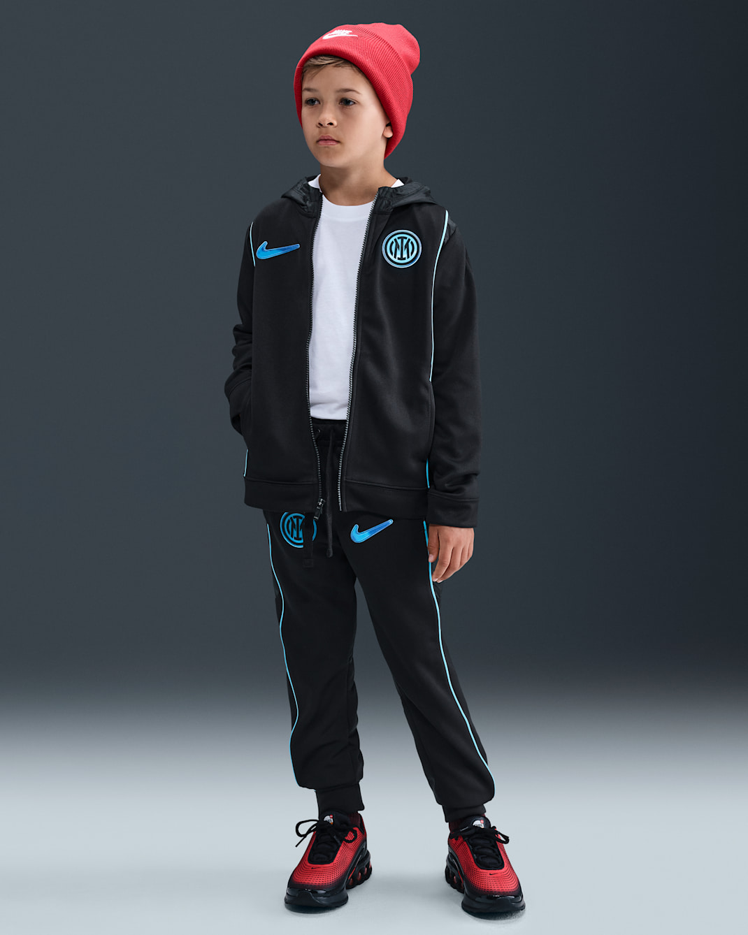 Inter Milan Older Kids' Nike Football Woven Tracksuit - Black/Chlorine Blue/Lyon Blue