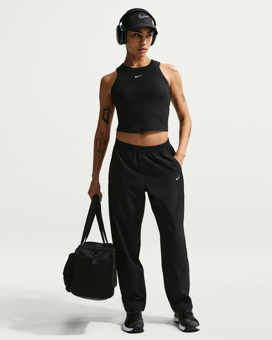 Nike One Women's Dri-FIT Mid-Rise Woven Pants - Black/White