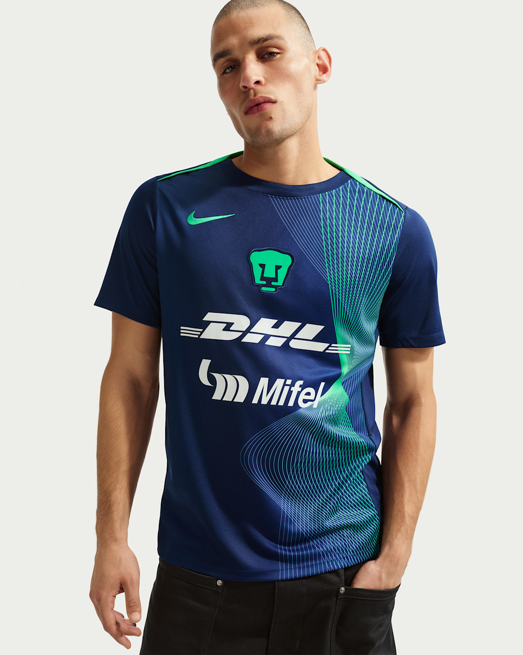 Playera de fútbol para antes del partido Nike Dri-FIT para hombre Pumas UNAM Academy Pro - Azul vacío/Verde impacto/Verde impacto
