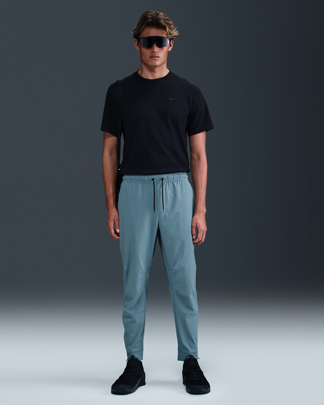 Nike Unlimited vielseitige Dri-FIT Hose mit Reißverschluss am Bündchen für Herren - Smokey Blue/Schwarz/Smokey Blue