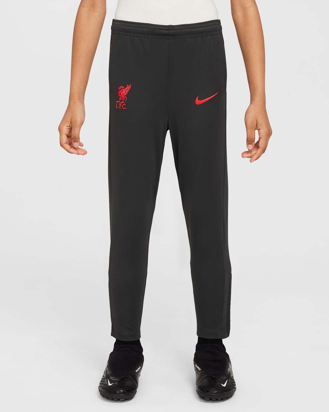 Třetí pleteninové fotbalové kalhoty Nike Dri-FIT Liverpool FC Academy Pro pro malé děti - Dark Smoke Grey/Chrome Yellow/Global Red