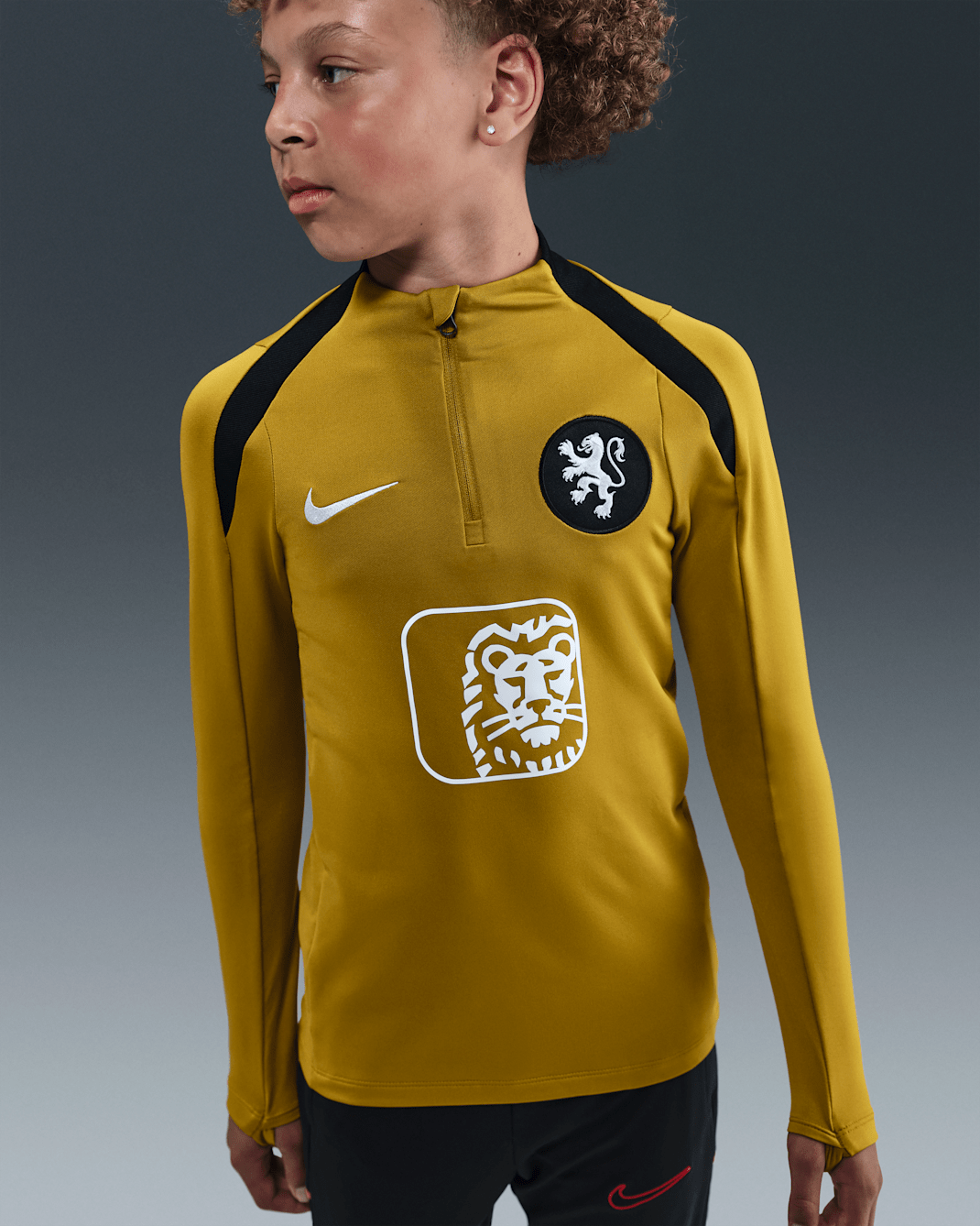 Netherlands Strike Older Kids' Nike Dri-FIT Football Drill Top - Bronzine/Black/White