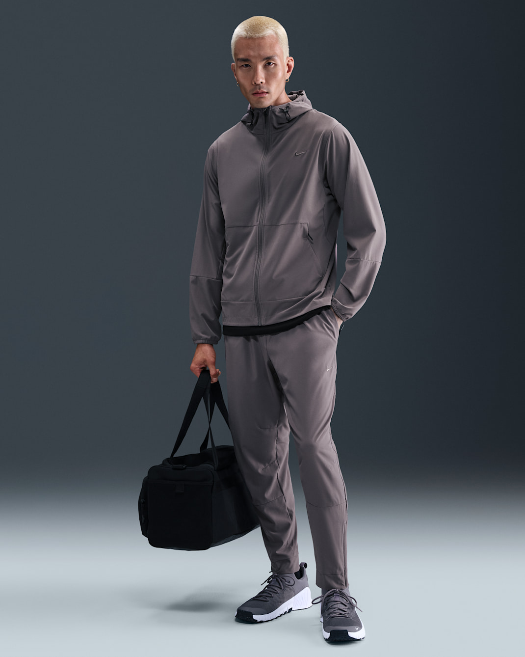 Nike Unlimited Men's Dri-FIT Zippered Cuff Versatile Pants - Cave Stone/Black/Cave Stone