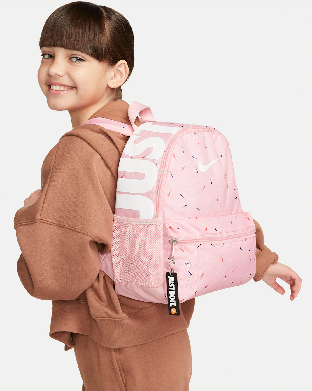 Nike Brasilia JDI Kids' Mini Backpack (11L) - Medium Soft Pink/Medium Soft Pink/White