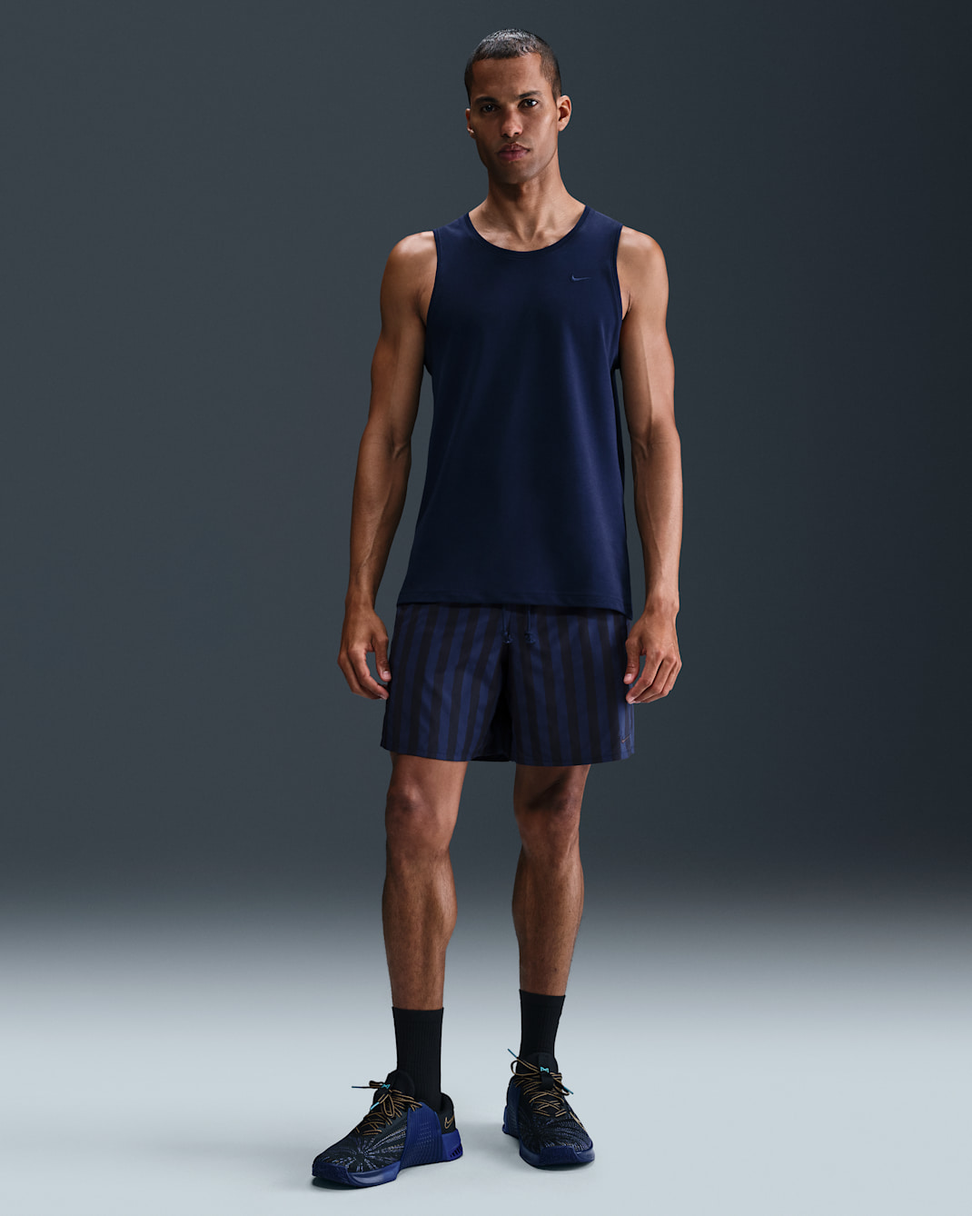 Shorts versátiles Dri-FIT de 18 cm sin forro para hombre Nike Unlimited - Negro/Azul vacío/Negro