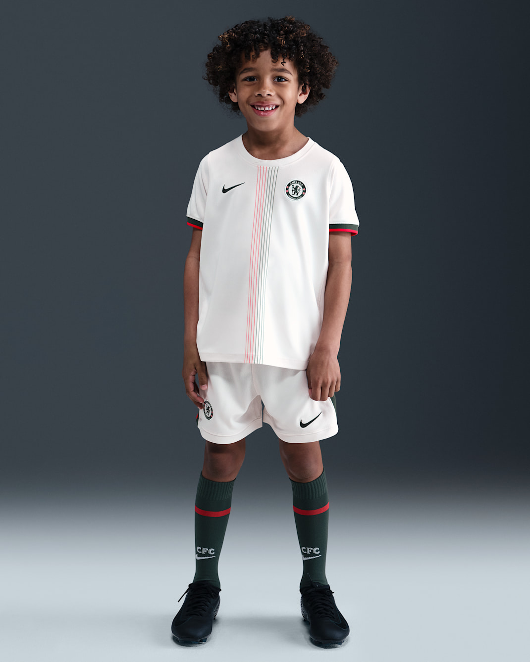 Chelsea F.C. 2025/26 Stadium Away Younger Kids' Nike Football Replica 3-Piece Kit - Phantom/Speed Red/Galactic Jade/Galactic Jade