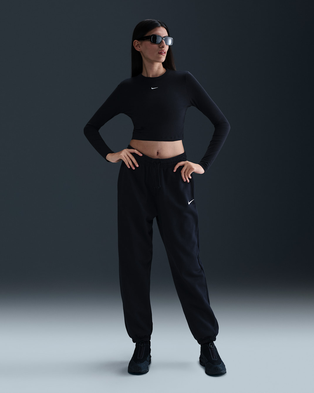 Pants de entrenamiento de French Terry oversized de tiro alto para mujer Nike Sportswear Phoenix Fleece - Negro/Vela