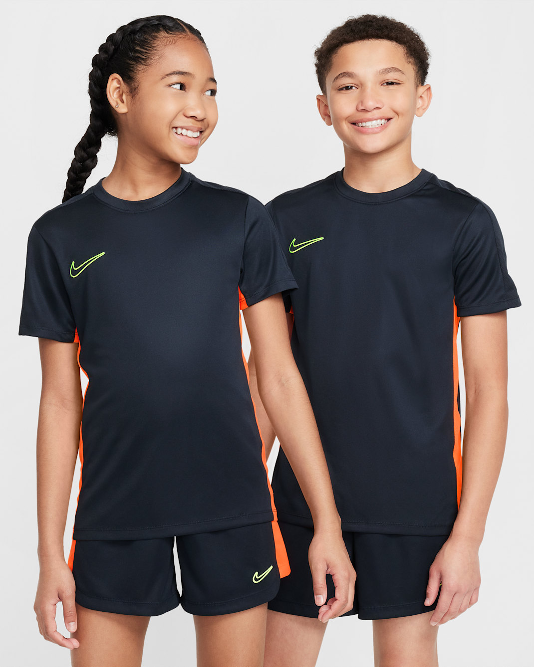 Nike Dri-FIT Academy 兒童足球上衣 - Dark Obsidian/Total Orange/Volt